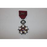 A Belgian Order Of The Crown with swords medal