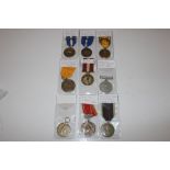 A collection of nine mixed medals including one na