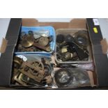 A box of various clock parts to include pendulums,