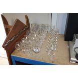 A quantity of various drinking glasses