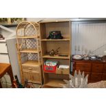 A light oak effect open fronted bookcase