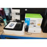 An HP Photosmart 325 printer and 10 inch digital p