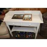 A white painted washstand fitted two drawers