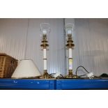 A pair of table lamps and shades