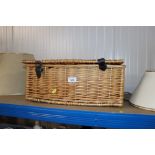 A wicker picnic hamper