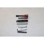 A small quantity of pens and two cheroot holders