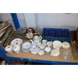 A boxed set of four Bohemia tumblers, Belleek shell decorated items, blue and white coffee ware, a