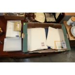 A box containing stamp albums; various loose stamp