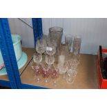 A quantity of various drinking glasses