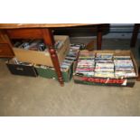 Four boxes of various DVDs