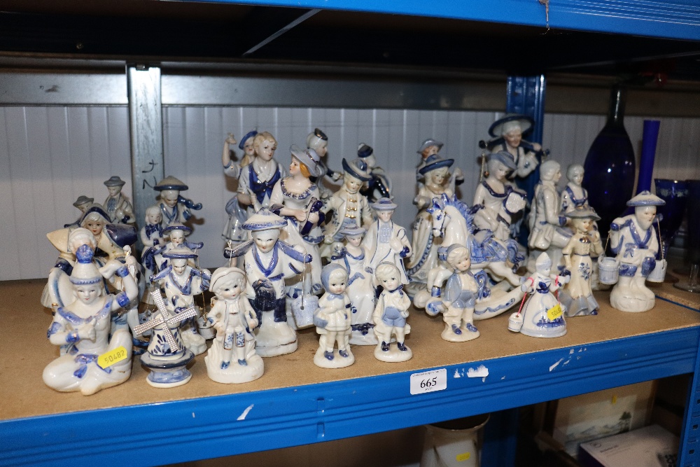 A quantity of various blue and white figures