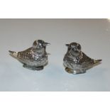 A pair of continental white metal salts in the for