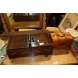 A wooden sewing box and another