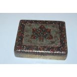 A white metal box with Eastern decoration