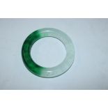 A two tone jade type bangle