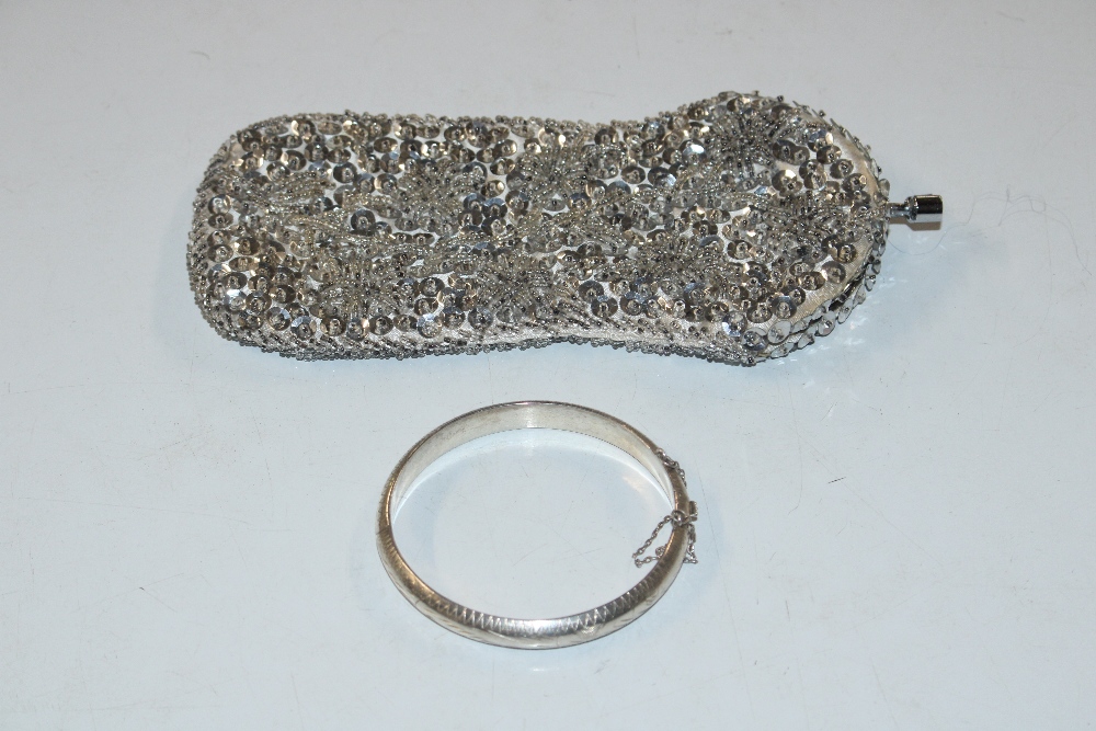 A Sterling silver bangle and purse