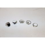 Five Sterling silver rings including Claddagh