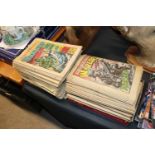 A quantity of Warlord comics