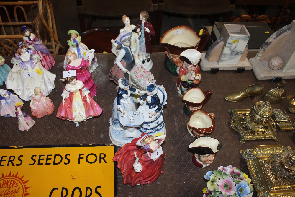 A Lladro porcelain figure of a girl with a barrow