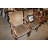 A pair of Gainsborough type elbow chairs