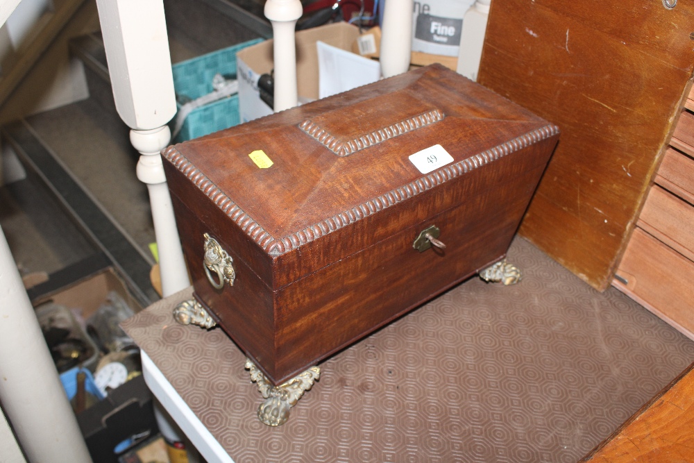 A 19th Century mahogany sarcophagus shaped two com