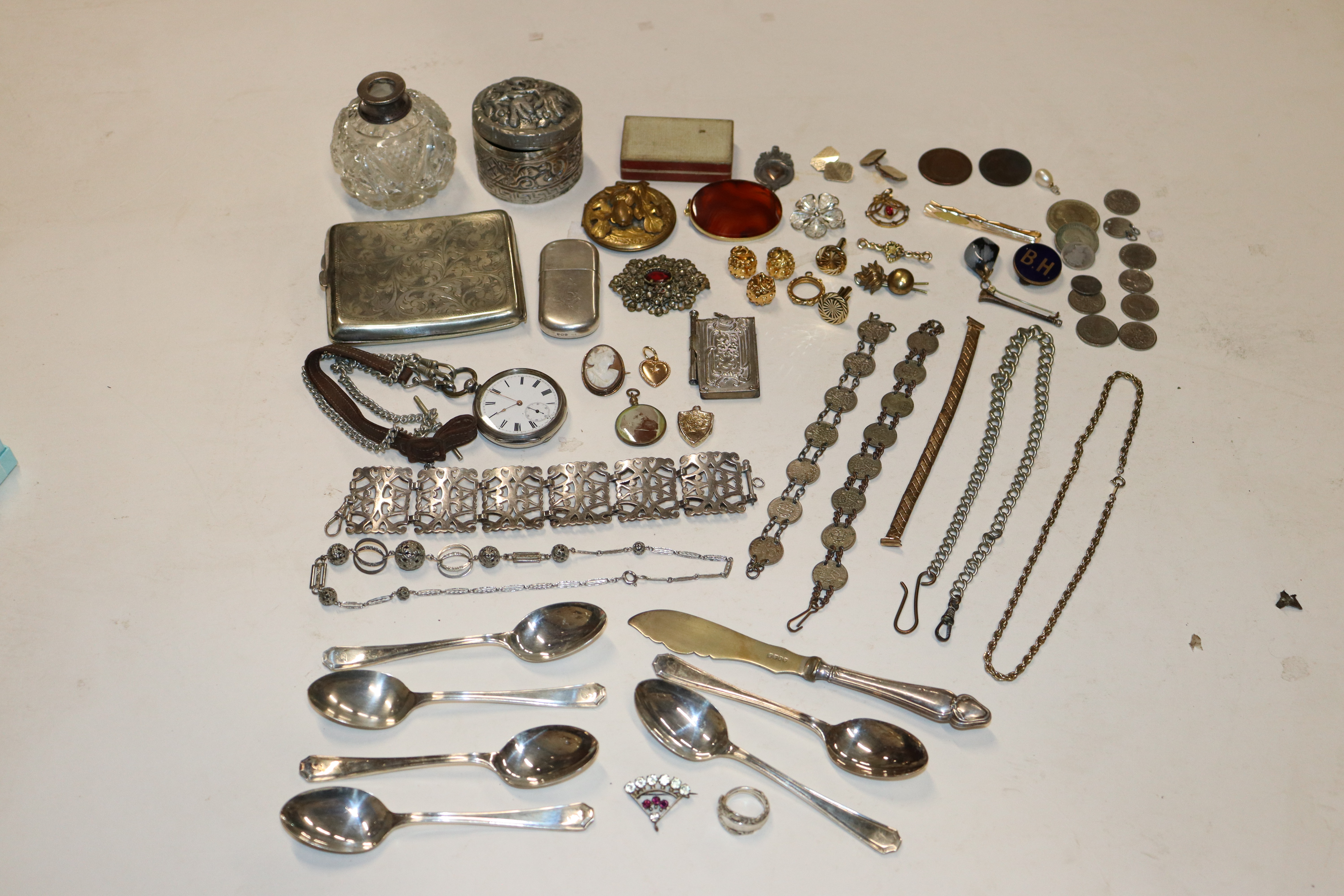 A box containing various silver plated items to in