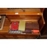 A mahogany storage box and miscellaneous contents