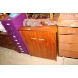 A teak side cabinet