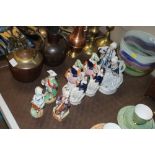 Six porcelain figurines and figure groups includin