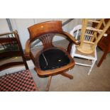 An early 20th Century elm revolving desk chair AF