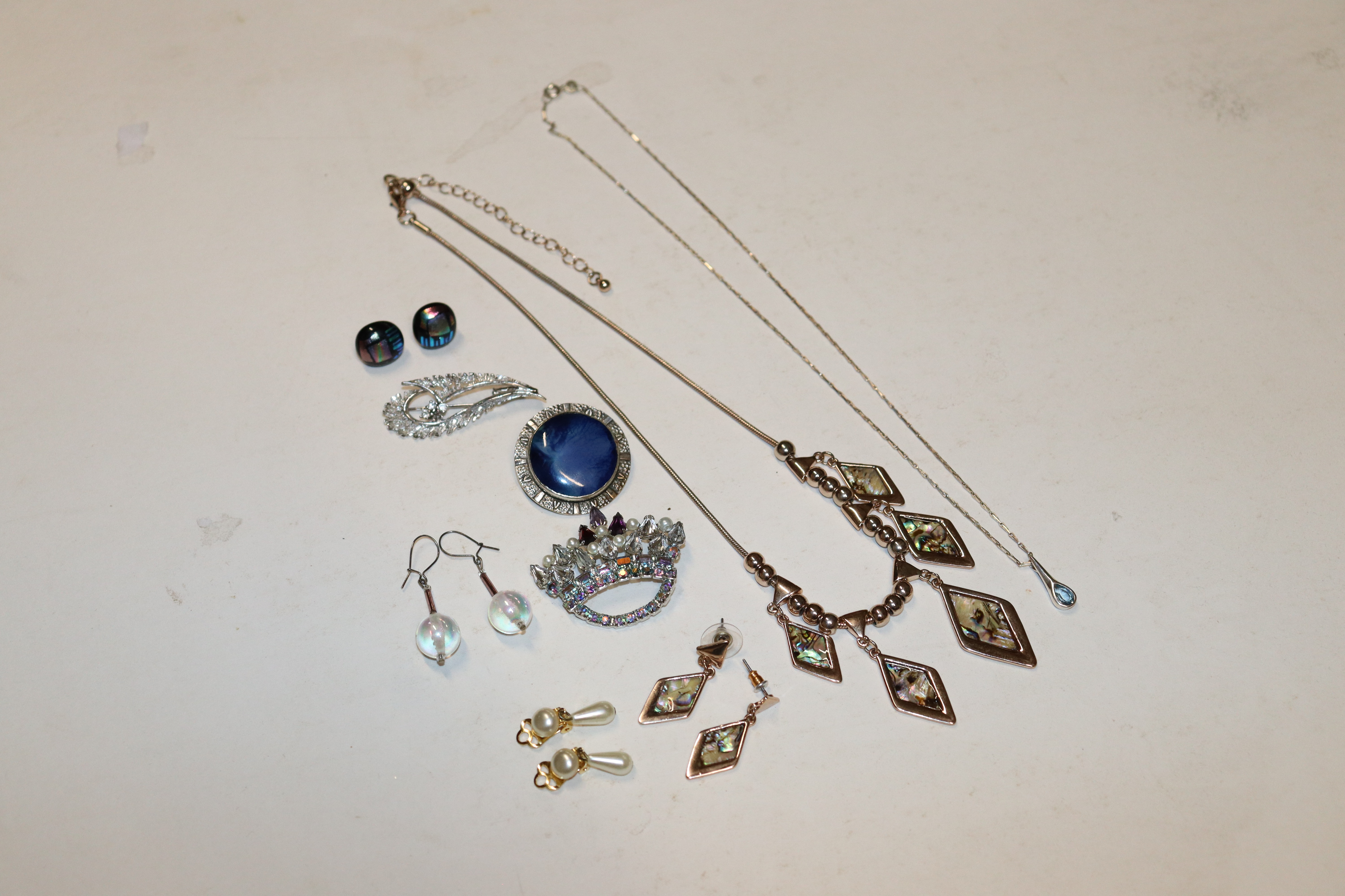 A Ruskin brooch and various costume jewellery