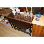 An oak gate leg dining table