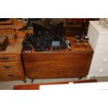 A 19th Century mahogany drop leaf dining table