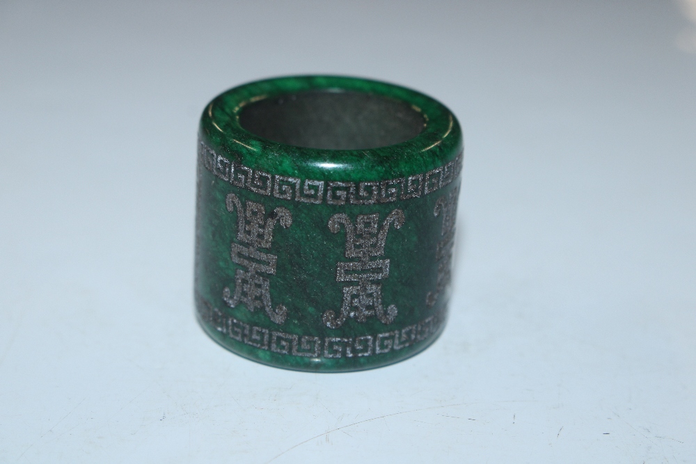 A jade type archers ring