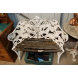 A vintage cast iron fern decorated garden seat AF