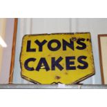 A vintage enamel advertising sign for Lyons Cakes