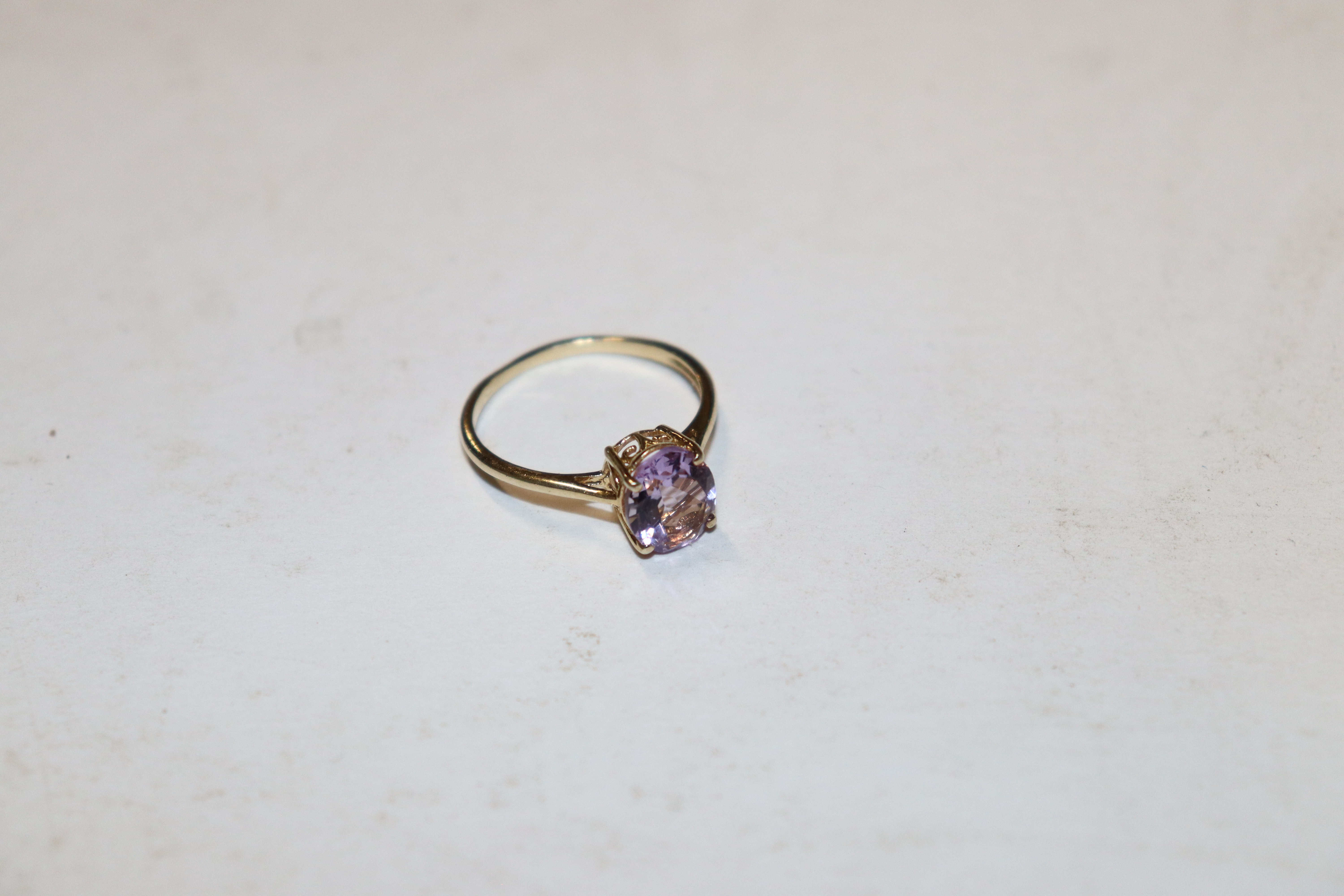 A Sterling silver gilt and amethyst set ring, size