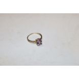 A Sterling silver gilt and amethyst set ring, size