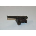 A brass model cannon