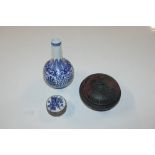 A Chinese blue and white vase; a Chinese white met