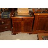 A reproduction yew wood side cabinet