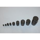 A set of nine bronze weights from 5gms - 500gms