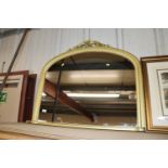 A gilt framed overmantel mirror