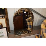 Three brass framed wall mirrors