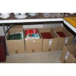 Four boxes of miscellaneous books including a run