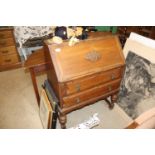 An early 20th Century oak bureau