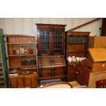 A 1930's oak and leaded glazed bureau bookcase