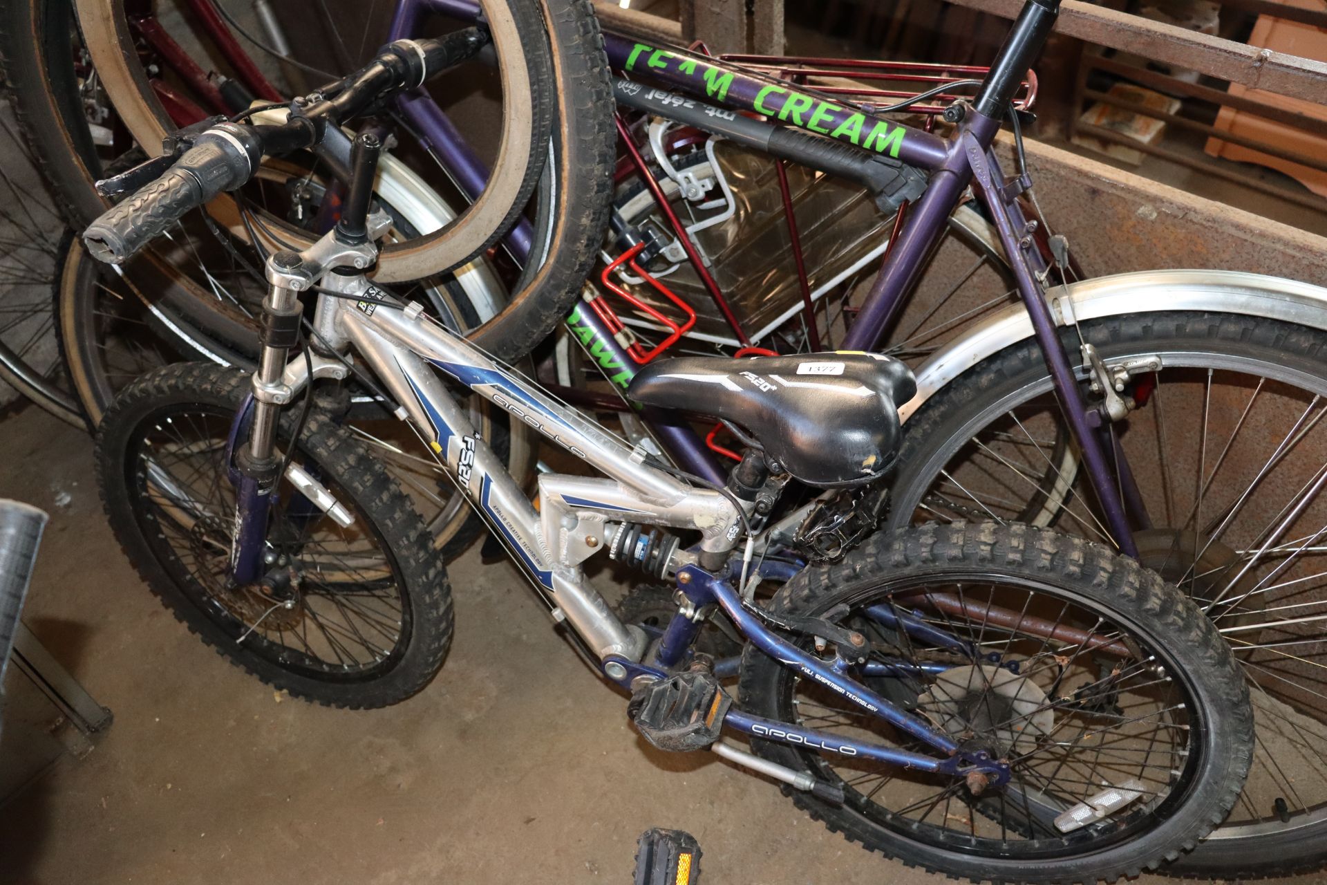 A child's Apollo FS.20 mountain bike with front an