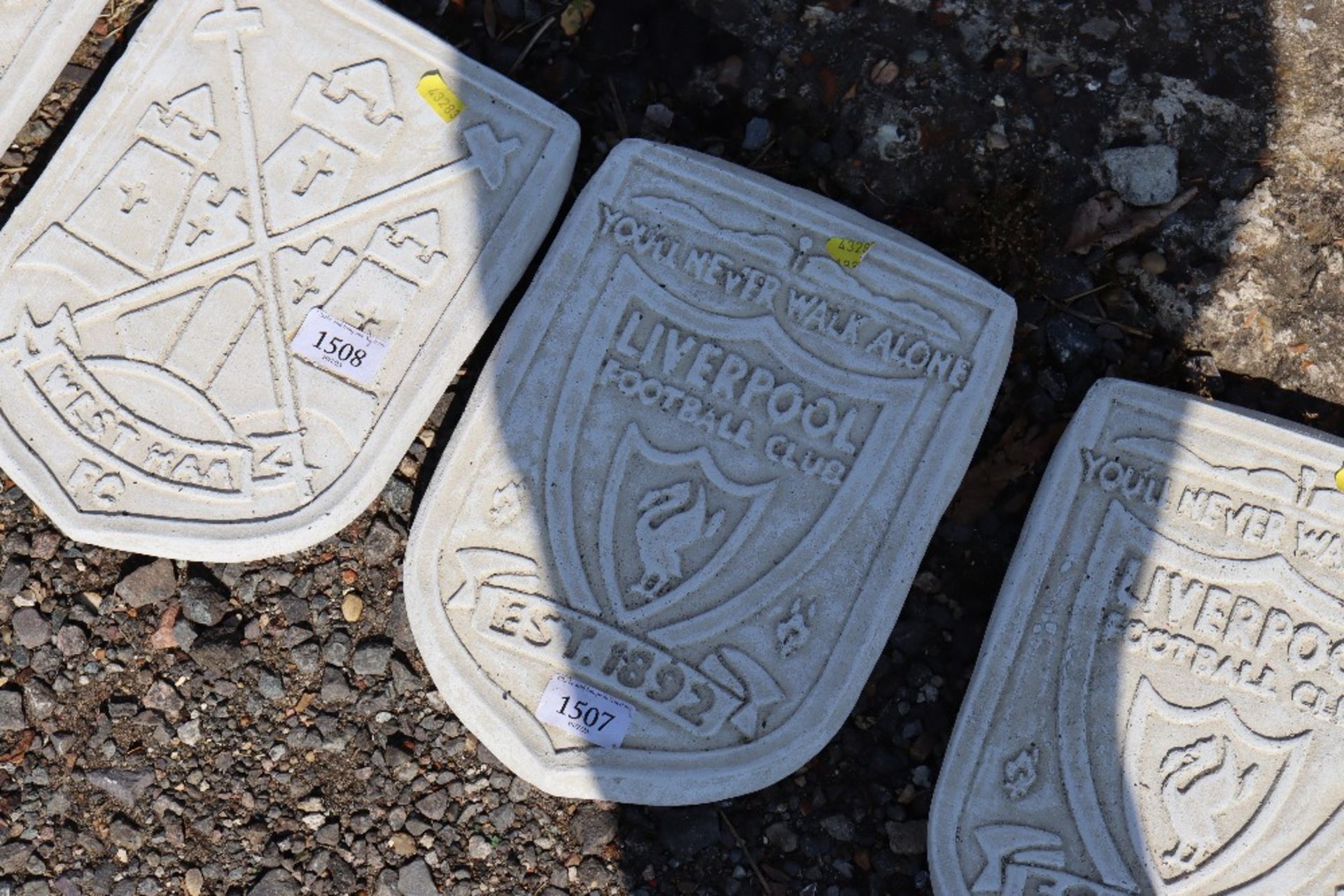 A cast concrete garden plaque for Liverpool Footba