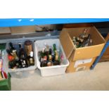 Three boxes of mostly opened bottles of alcohol